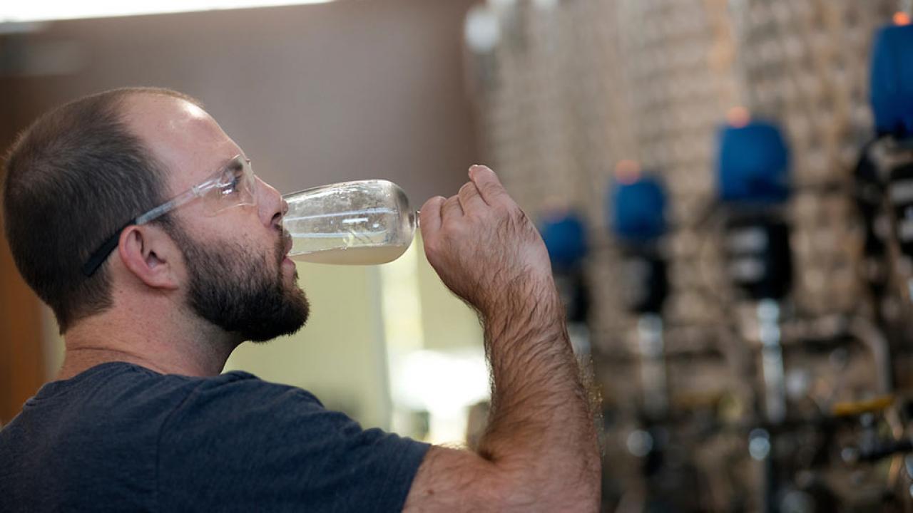 A ϲʿͼ student sips his own ale creation in beer making class