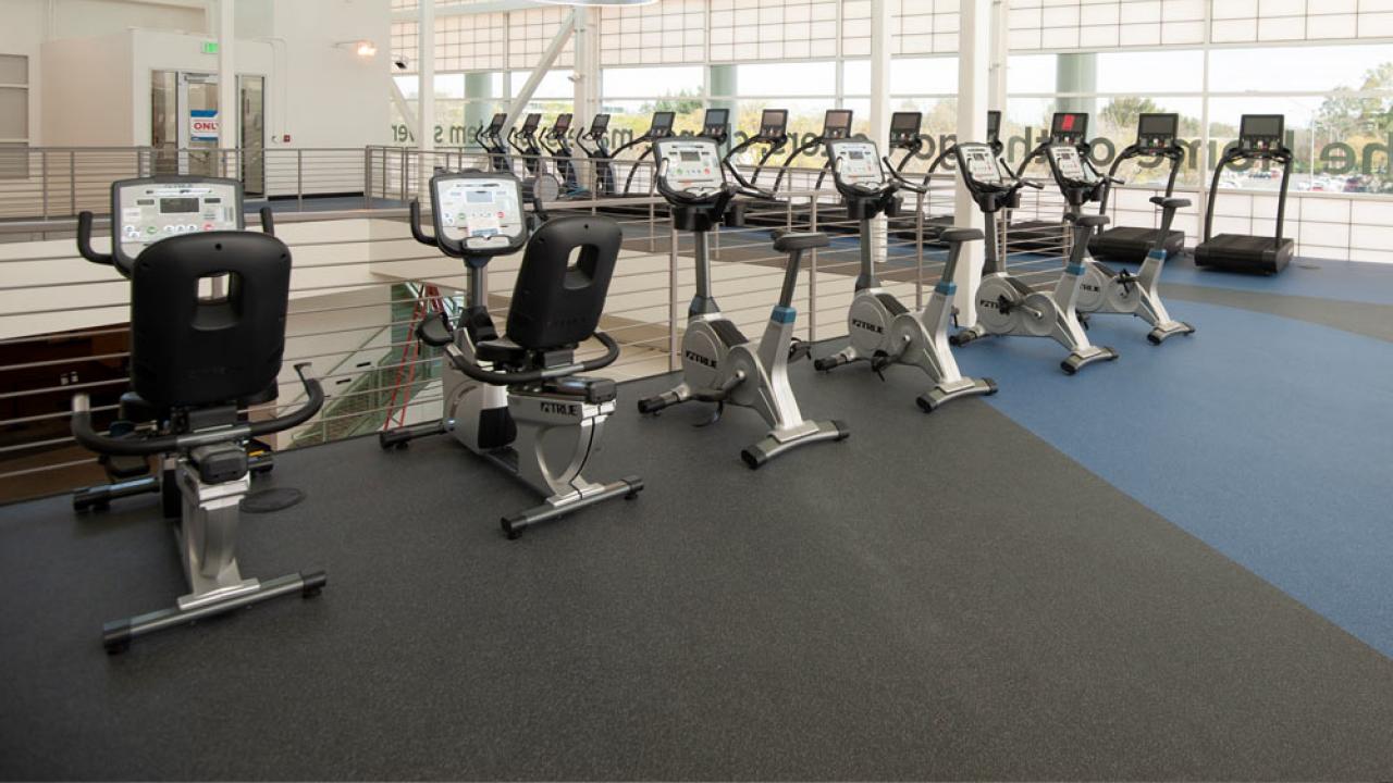 A row of exercise machines on the upper level of the ϲʿͼ Activities and Recreation Center